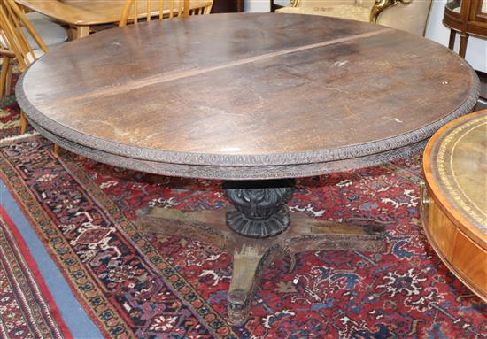 A 19th century padouk loo table W.152cm